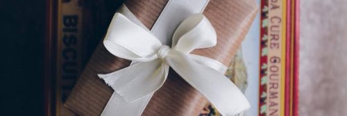 present box wrapped by white banner