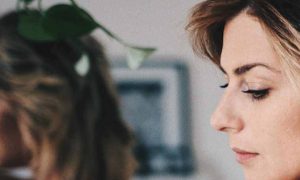 woman worrying face looks downward