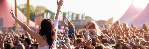 crowd people show excitement raise hand celebrate