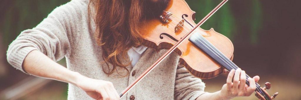 woman plays violin