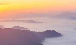 mountain cloud shining sun