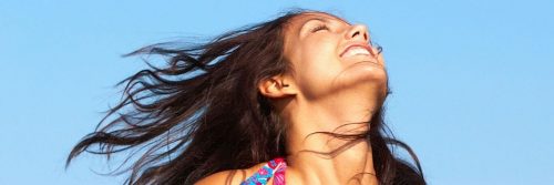 woman happy exciting face gratitude life in blue sky